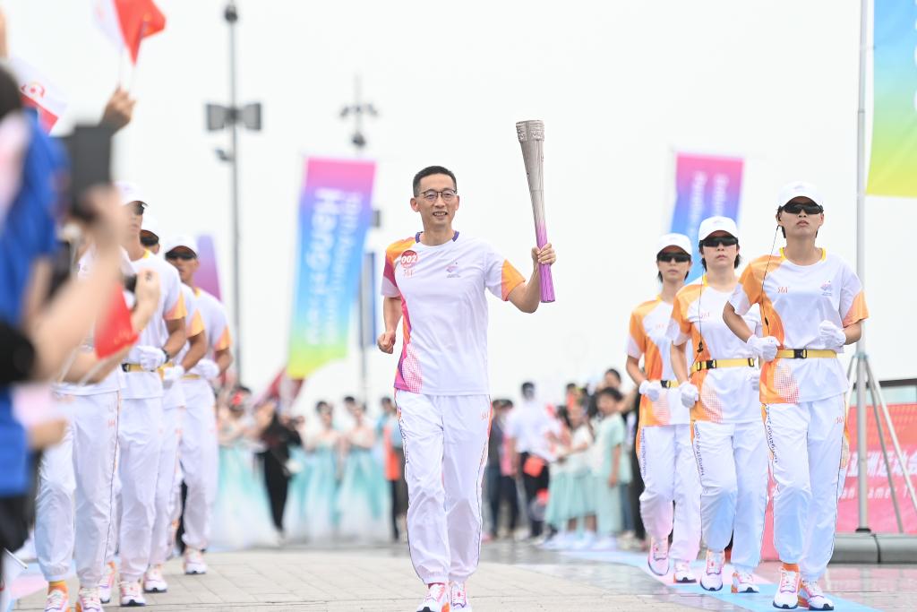 奔向同一个梦想——杭州亚运会火炬手期待新葡萄娱乐下载体育精神“闪耀时刻”(图2)