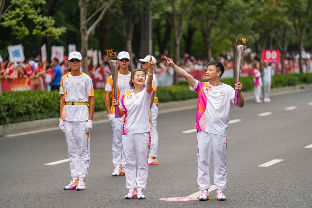 奔向同一个梦想——杭州亚运会火炬手期待新葡萄娱乐下载体育精神“闪耀时刻”(图3)